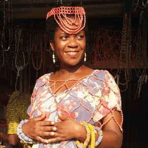 African woman wearing lots of tradtional handcrafted beads