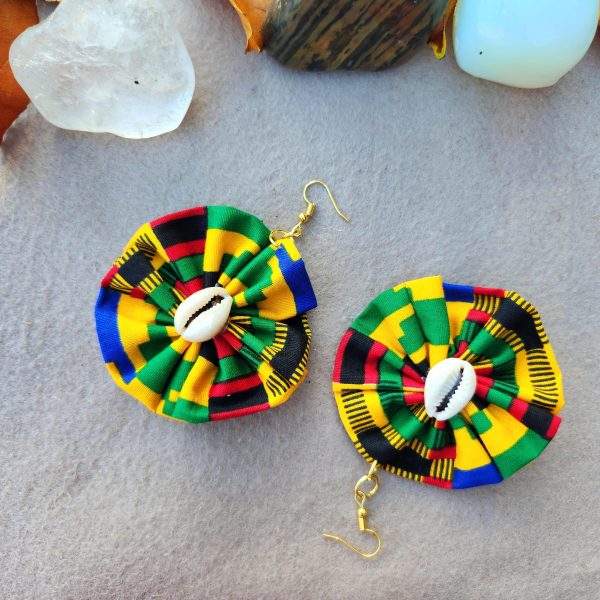 a pair of colourful earrings with cowrie shell by Akoscreative